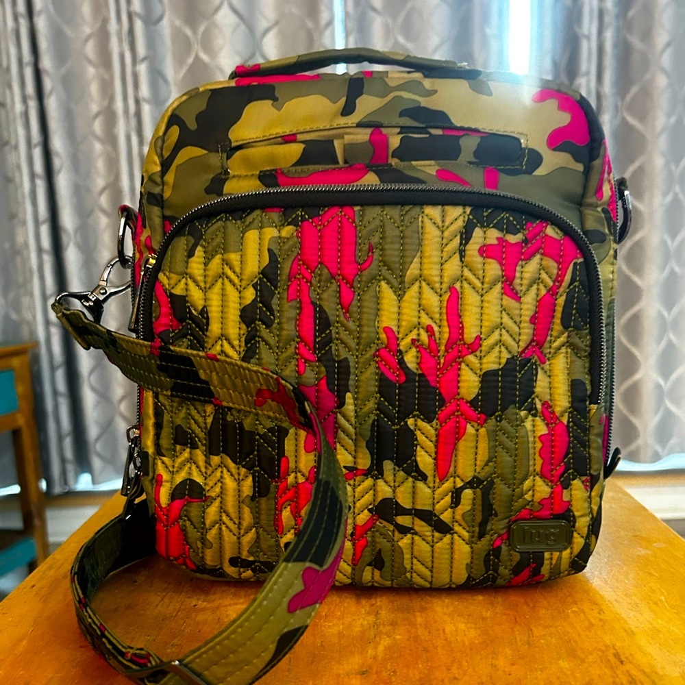 Lug Ranger in like new condition. Color: Camo Orchid
